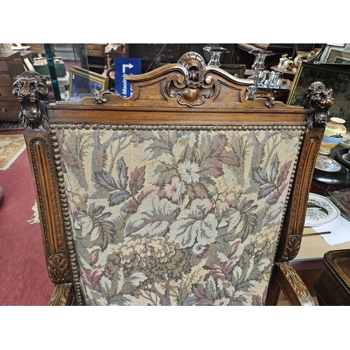 57 - A Fabulous 19th Century Walnut Hall Chair with lions head supports and tapestry style upholstery wit... 