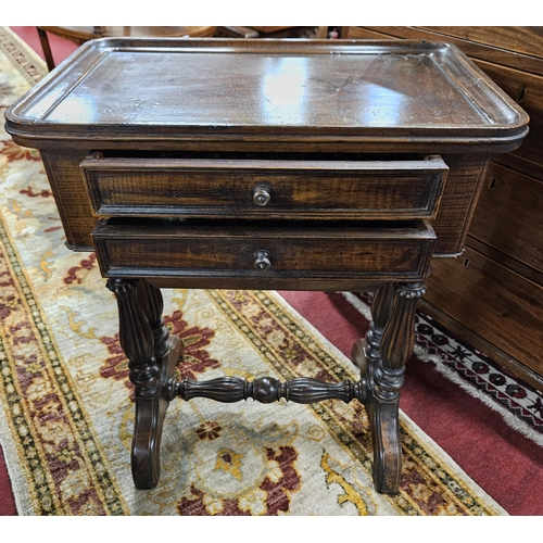 65 - A unusual 19th Century Walnut and grained twin drawer work Table with stretcher base.
65 x 36 x 59 c... 