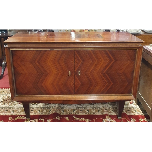 721 - A Superb Art Deco style Rosewood two door Cabinet with brass banded outline on simple tapered legs. ... 