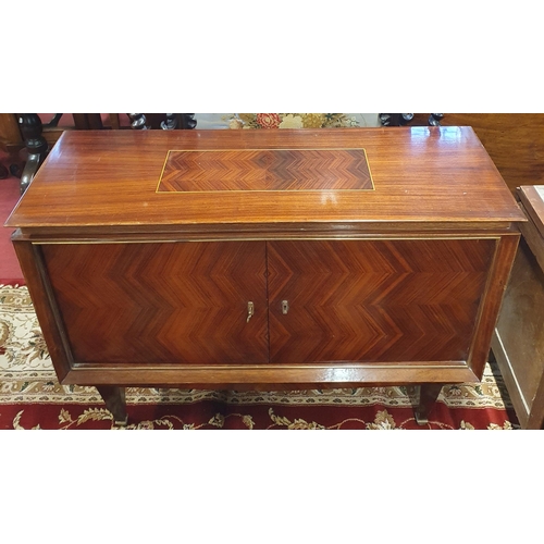 721 - A Superb Art Deco style Rosewood two door Cabinet with brass banded outline on simple tapered legs. ... 