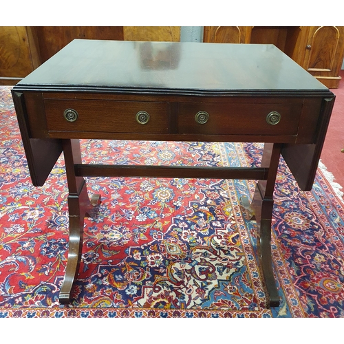 766 - A 20th Century Mahogany Sofa Table of small proportions with twin frieze drawers.
132 x 56 x H 75 cm... 