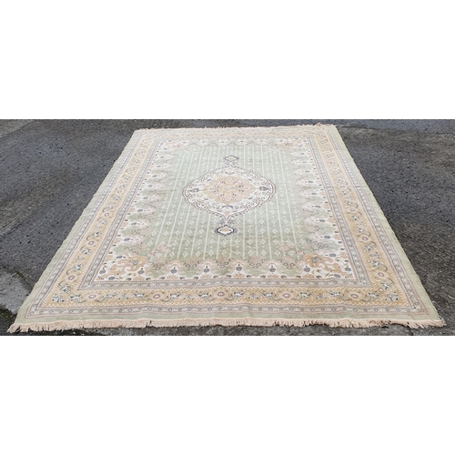 712 - A very large Belgian green ground Carpet with a large central medallion design.
L 340 x W 220 cm app... 