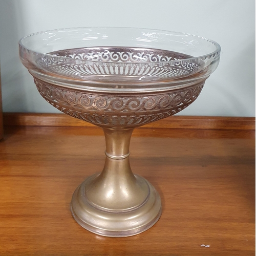 789 - An early 20th Century Metal and Glass Centrepiece with pierced detail. D 19 x H 20 cm approx.