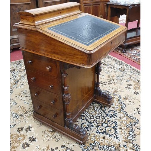 832 - A Victorian Walnut and Inlaid Davenport of really good quality with tooled leather flap.
53 x 54 x H... 