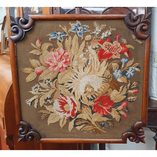 894 - A Regency Rosewood Pole Screen with tapestry upholstered centre. H 138 cm approx.