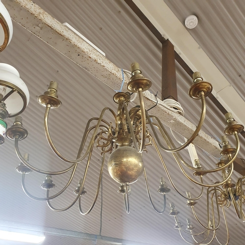 717 - A pair of large Brass Chandeliers.