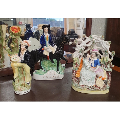 93 - A group of three 19th Century Staffordshire Flatback Figures to include Dick Turpin.
H 24 x W 19 cm ... 