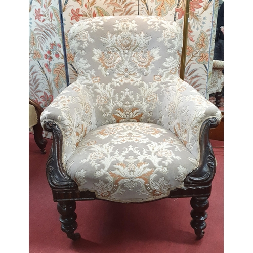 613 - Of Superb quality. A 19th Century Mahogany showframe Armchair with dab button back and carved front ... 