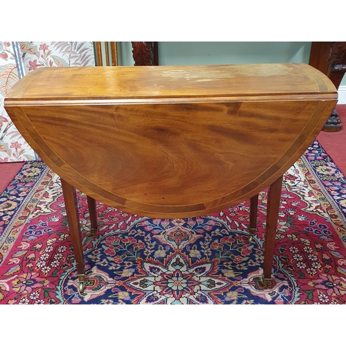 740 - An early 19th Century Mahogany and Inlaid Dropleaf Table. W 98 x D 113.5 x H 74 cm approx.