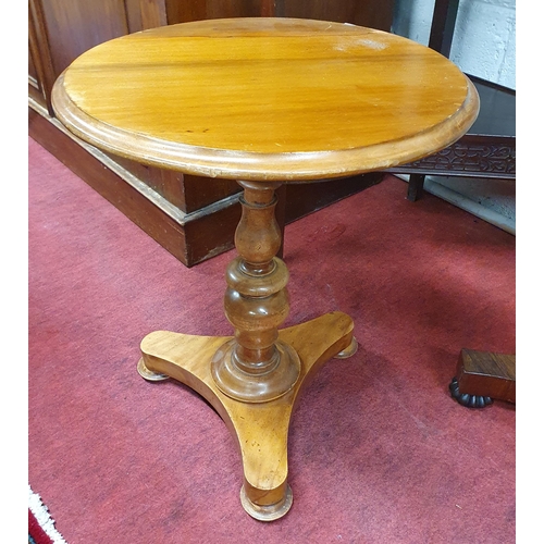 881 - A 19th Century Mahogany circular Lamp Table of neat proportions on platform base. D 43 x H 52 cm app... 