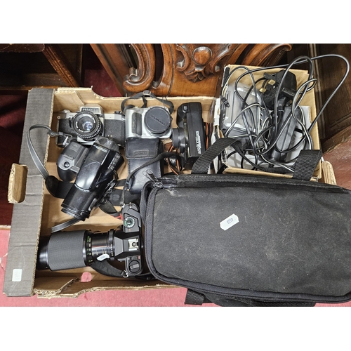 1383 - A large quantity of Cameras and equipment. Held in the old W/S.