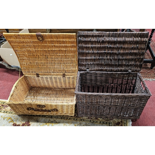 1385 - Two Wicker picnic/hamper Baskets.
H 25 x 60 x 42 , H 33 x 58 x 32 cm approx.