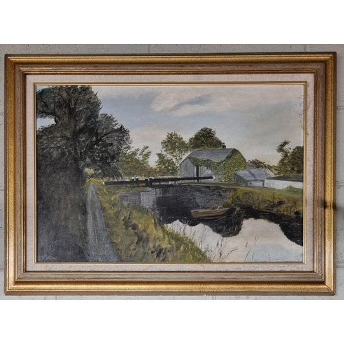 113 - A 20th Century Oil on Canvas of a lough scene. Signed M Travers LL. Well framed in a good frame. 50 ... 