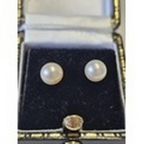 410 - A pair of 9ct Gold and Pearl Earrings.  Sold for Charity/Storage fees due to non collection.