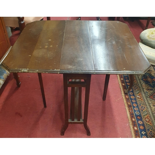 733 - An Edwardian Mahogany Sutherland Table.