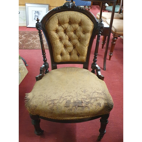 738 - A 19th Century Mahogany showframe Salon Chair on turned supports and brass castors. BH 80 x W 50 x D... 