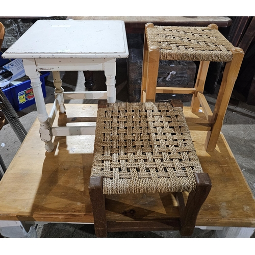 560 - A painted Table along with two wicker Stools. Held in Old Workshop.