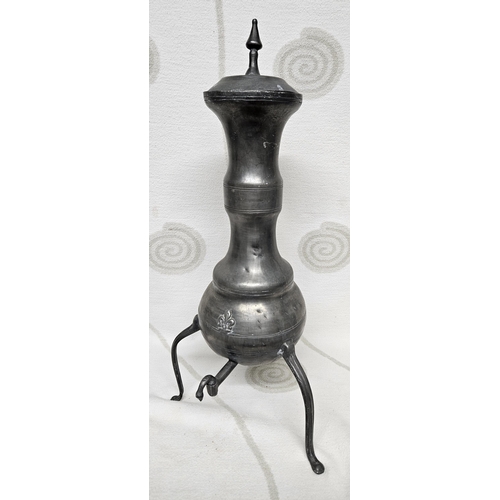 557 - A very unusual 18th early 19th Century Pewter Chocolatier standing on tripod supports.
60 x 26 cm ap... 