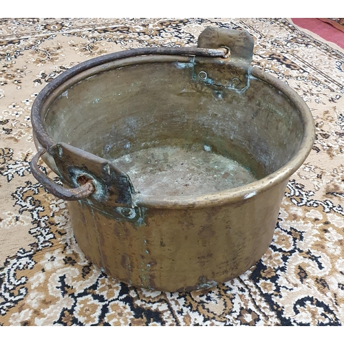 549 - A really good early 19th Century Brass Cauldron with wrought iron handle. D 44 x H 26 cm approx.