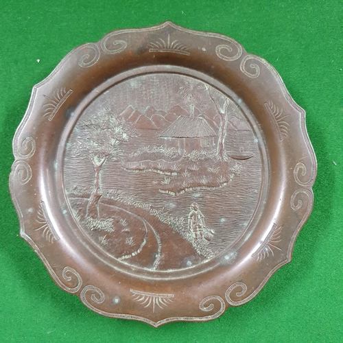 402 - A good Oriental Bronze Plate with a highly carved and moulded detail centre. H 12 x D 18 cm approx.,... 