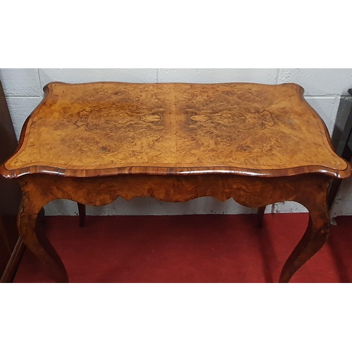 103 - A 19th Century Walnut foldover Card Table with serpentine outline on simple cabriole supports.
97 x ... 