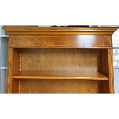 29 - A good 20th Century open Book Case with highly inlaid top, depicting bells and swags with adjustable... 