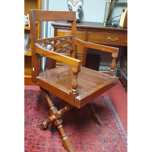 40 - A 20th Century Rosewood Desk Chair with stretchered base along with a square gallery topped side tab... 