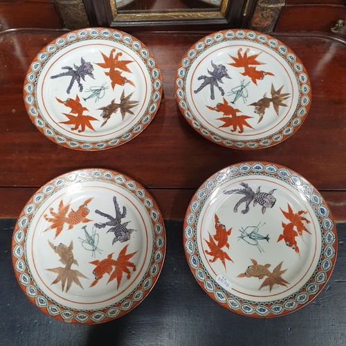 86 - Four early 20th Century Chinese hand painted Plates decorated with fish and crustations. D 21.5 cm a... 