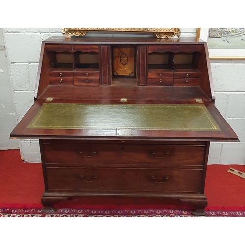 111 - A good early Georgian Mahogany Bureau with fitted pigeon hole interior and two short over three long... 