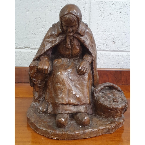 143 - A lovely and well sculpted figure of an elderly woman by F Trinque. Signature LL.
W 27 x H 28 cm app... 