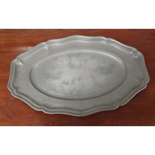 285 - A 19th Century Pewter centre Dish and Tray. 
33 x 22 x 22 cm approx.