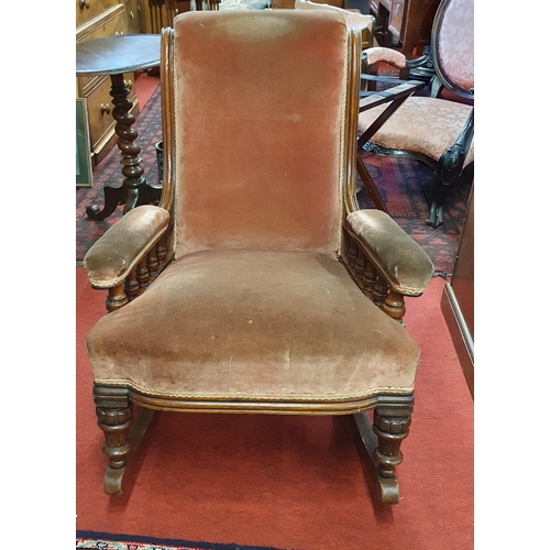 416 - A 19th Century Mahogany showframe Rocking Chair with turned reeded supports. W 67 x SH 48 x BH 87 cm... 