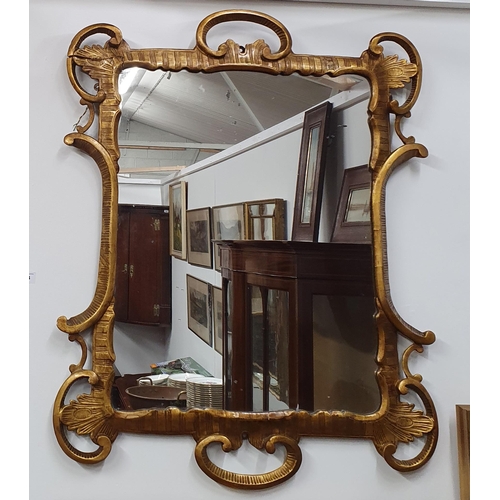 583 - A good late 19th Century Timber and Plaster Gilt Mirror with pierced outline.
88 x 72 cm approx.