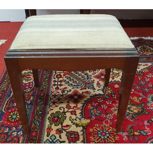 604 - A Modern Mahogany Rectangular Piano Stool.
W 42 x D 33 H 43 cm approx.