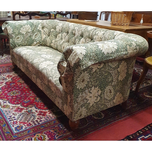 605 - A good deep buttoned Chesterfield Couch with William Morris Fabric, with two arm savers.
L 200 x W 9... 