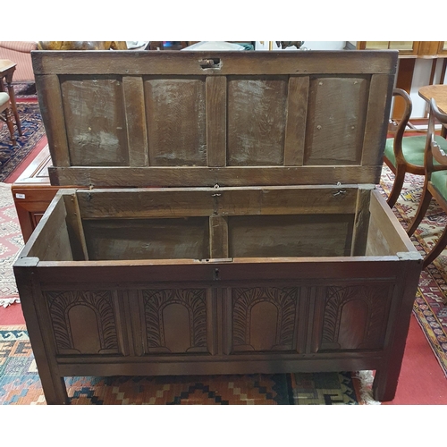 386 - A good early 19th possibly 18th Century Elm four panelled Blanket Chest with highly carved front.
14... 