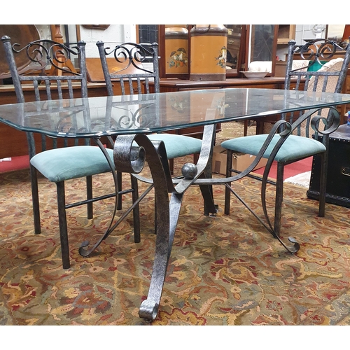 542 - Modern wrought Metal and glass top seven-piece dining Suite, comprising table with scroll and ball f... 