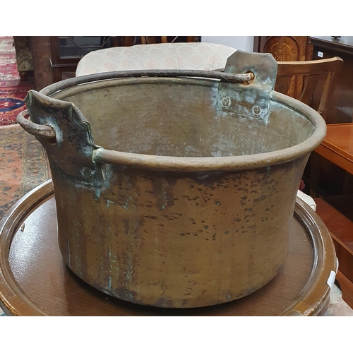 549 - A really good early 19th Century Brass Cauldron with wrought iron handle. D 44 x H 26 cm approx.