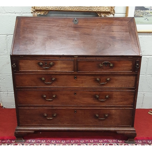 111 - A good early Georgian Mahogany Bureau with fitted pigeon hole interior and two short over three long... 