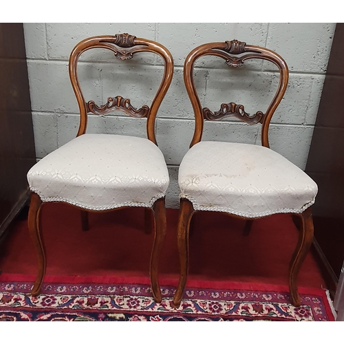 114 - A lovely pair of 19th Century Walnut Chairs with cream upholstered seats with cabriole legs and pier... 