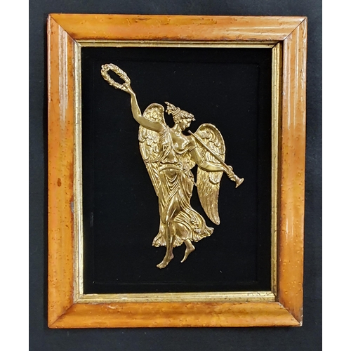 117 - A 19th Century Brass Grecian Lady mounted on a black velvet panel with period birds eye maple frame.... 