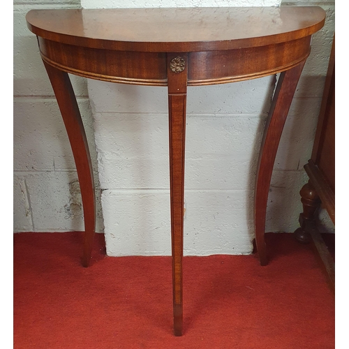 127 - A 20th Century Mahogany and veneered halfmoon Table of neat proportions. 61 x 31 x H 70 cm approx.