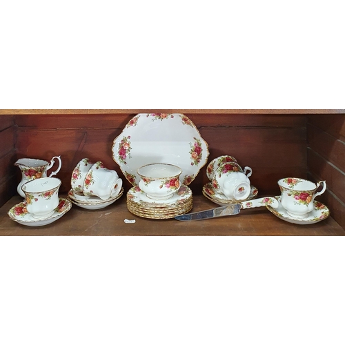 128 - A Royal Albert 'Old Country Rose' Tea Set  consisting of six cups, saucers, plates, a cake plate, mi... 