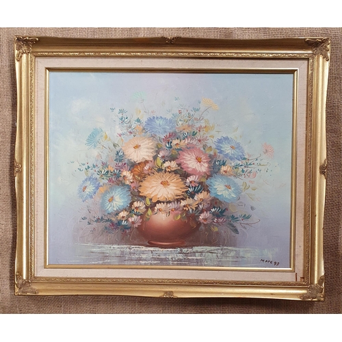 187 - A 20th Century Oil On Canvas Still Life of Daisies in a vase, indistinctly signed Marc LR. In a gilt... 