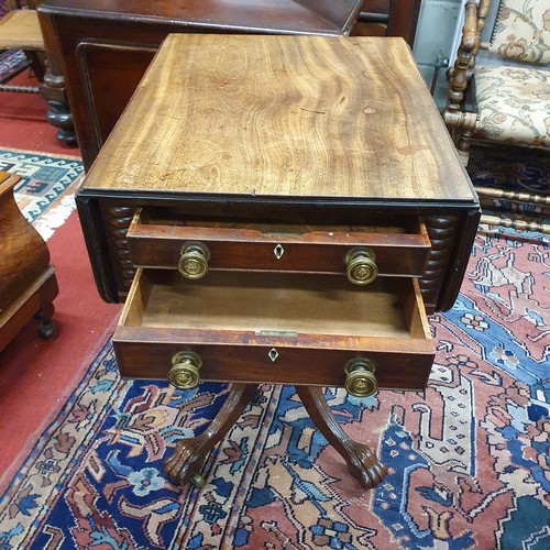 624 - Of Superb quality. An early 19th Century Mahogany Irish drop leaf Side Table on turned reeded suppor... 