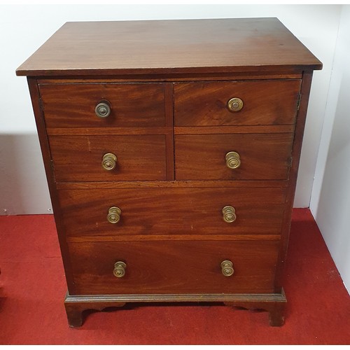 554 - A Regency Mahogany Commode with a blind drawer panelled front on bracket feet. 65 x 48 x H 80 cm app... 