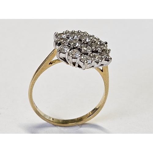 353 - An 18ct Gold and Diamond cluster Ring with brilliant cut Diamonds, size M, good colour and clarity.