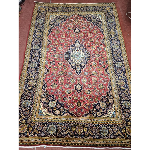 625 - A fine handwoven full pile Persian Kashan Carpet with a traditional Kashan floral design.
202 x 302 ... 