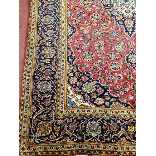 625 - A fine handwoven full pile Persian Kashan Carpet with a traditional Kashan floral design.
202 x 302 ... 