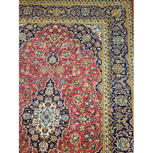 625 - A fine handwoven full pile Persian Kashan Carpet with a traditional Kashan floral design.
202 x 302 ... 